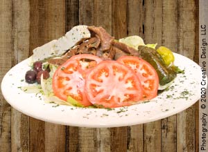 Traditional Greek gyro with tzatziki — Greek cuisine at Lookin Good Restaurant